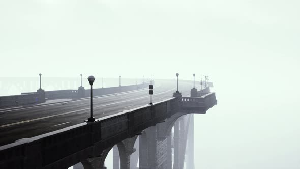 View of the Bridge Over the River in Fog alt