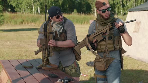 US Soldiers Assembling Sniper Rifles