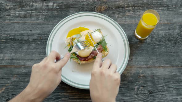 Eggs Benedict with Bread and Tomato on a Plate with Becon Morning Sandwich