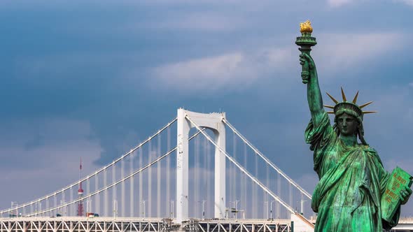 time lapse of unidentified tourist visited the Statue of Liberty and Rainbow bridge at Odaiba