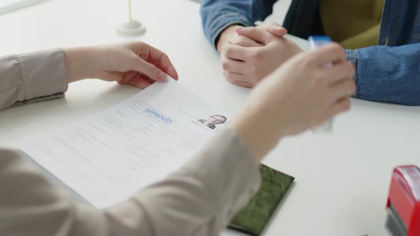 Happy Applicant Getting Approval for Schengen Visa in EU Embassy