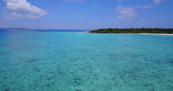 Daytime aerial abstract view of a sandy white paradise beach and turquoise sea background in best qu