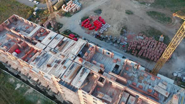 Aerial View of the Construction Site of a Living Building on a Summer Day