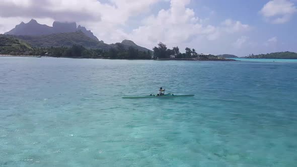 A Man on the Sea Swims in Kayak Ocean