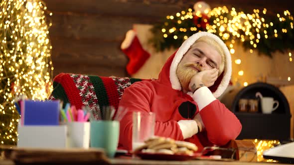 Funny Sleeping Santa, Santa Claus Relaxing After or Before Work in Christmas Room