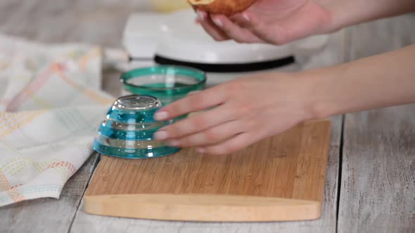 Woman Making a Waffle Cups for Ice Cream