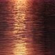 sunset reflection on the water, beautiful water ripples, golden color - VideoHive Item for Sale