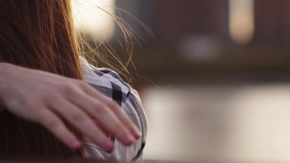 A Man's Hand is Placed on a Woman's Shoulder Closeup