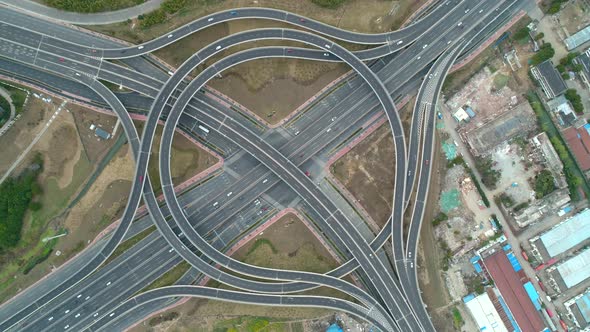 Top View to the Cars Driving on Multilevel Highway on the Sunset