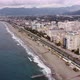 Aerial View Flying over the Resort Town Near the Embankment and the Mediterranean Sea - VideoHive Item for Sale