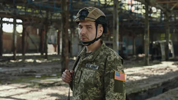 American Servicemen Looking at Camera on Abandoned Factory