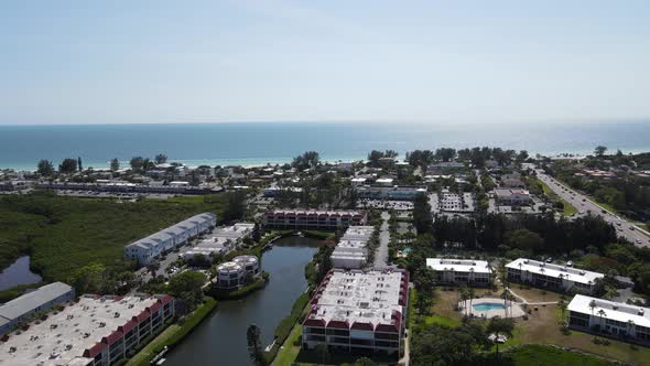 Aerial flying to Holmes Beach on Anna Maria Island in Manatee County, Florida