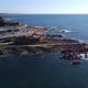Aerial View of a Stone Cape in the Ocean and a Roundabout in Porto Portugal - VideoHive Item for Sale