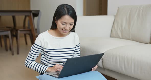 Woman work on computer at home