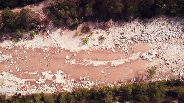 Mountain river with muddy water