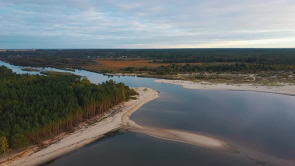 The Gauja River Flows Into the Baltic Sea Gulf of Riga Aerial 4K Shot