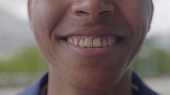 Closeup Shot of Young African American Man Smiling Outdoor