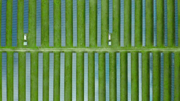 Flight Over a Solar Power Station for Production of Electricity. Vertical Straight Lines of Solar