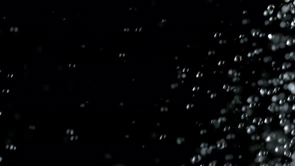 Super Slow Motion Shot of Water Rain at 1000Fps Isolated on Black Background