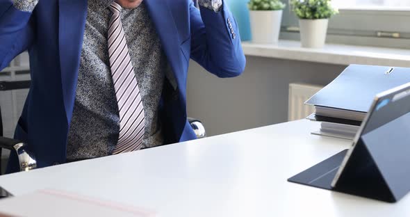 Businessman Putting on Headphones and Seeing Good News on Digital Tablet  Movie Slow Motion