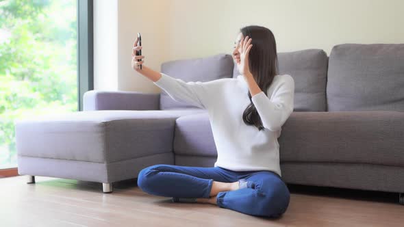 Young asian woman use smart phone