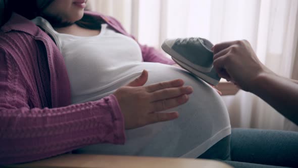 Pregnant Couple Feels Love and Relax at Home