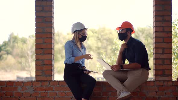 Engineer Architect  In Face Mask Cooperating Working, Engineer In Hard Hat Developing In Lockdown
