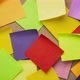 Colorful blank sticky notes being dropped onto canvas board - VideoHive Item for Sale