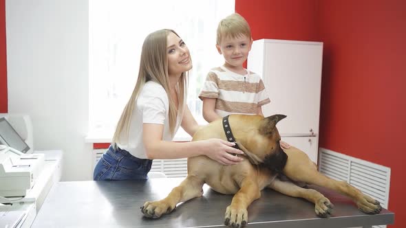 Caucasian Family Brought Their Pet for Another Examination in Veterinary Clinic