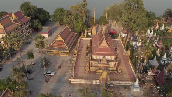 Golden Temple of Phnom Penh and pagoda buildings in the surrounding area view to Mekong River