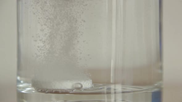 Effervescent Soluble Tablet Dropped Glass Dissolving With Sound