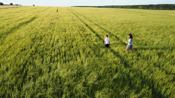 Woman Walking in the Field