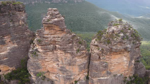 Blue Mountains National Park. Three Sisters, Beautiful Cliffs in the Middle of a Green Bush. Aerial