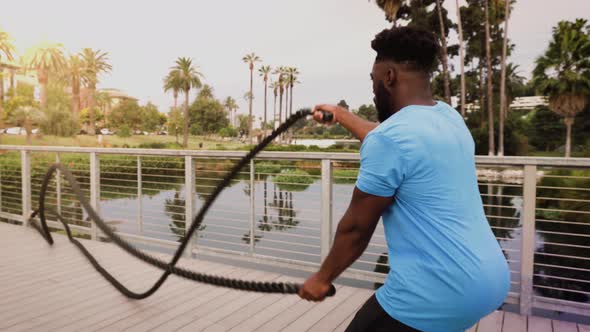 Athlete man working out in the park