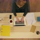 Pretty Young Woman Sitting at Desk and Typing on Laptop - VideoHive Item for Sale