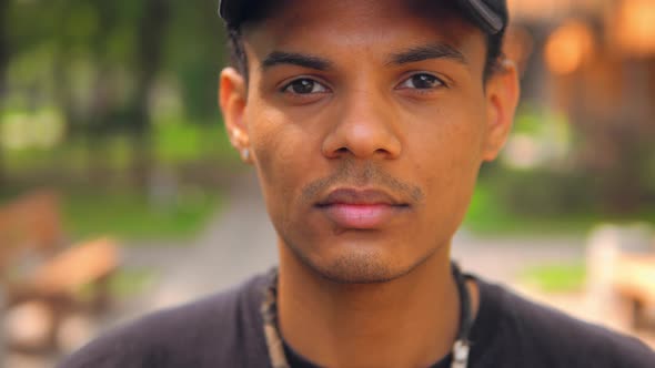 Face Handsome Guy Standing in Summer Town