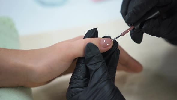 Manicure Master Applying Nude Gel Nail Polish, Beauty Salon Procedure, Hygiene