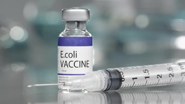 E.coli vaccine vial in medial lab with syringe