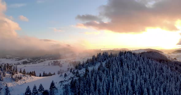 Drone Aerial Trees Clouds Fog Snow Wind Sunset Hyperlapse - Cheile Gradistei, Fundata, Romania