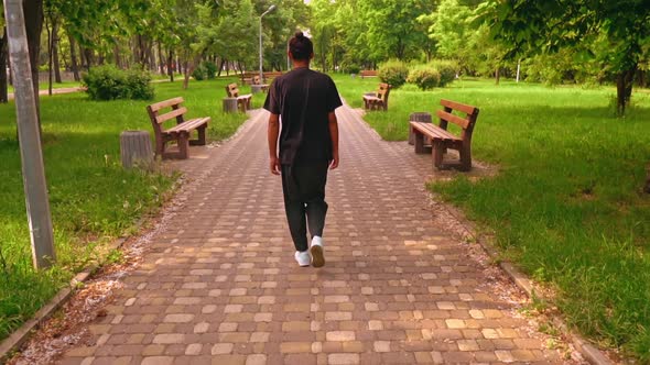 African American Man Walking on the Street