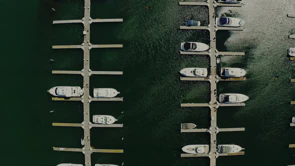 Aerial Drone Shot of Yacht and Sailboats Moored at the Quay