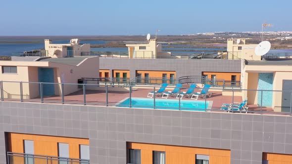 Aerial View of the Urban Area of Portugal in the South of Houses with Modern Infrastructure Swimming