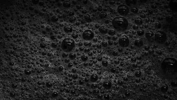 Black Foam With Bubbles Popping