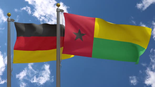 Germany Flag Vs Guinea Bissau On Flagpole