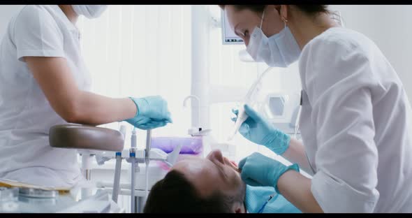 Dental Examination of the Patient's Teeth Using a Camera