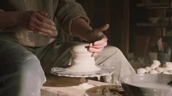Woman Potter Is Shaping Wet Clay