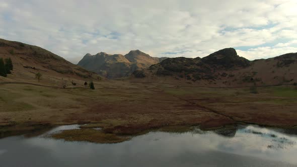 Hills and lake in Lake District National Park, Cumbria, UK