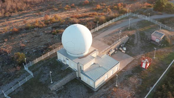 Giant radome sphere hiding radar antenna and surveillance equipment used by defense system - dome