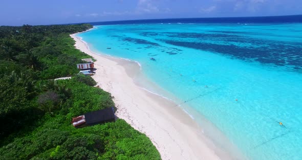 Beautiful birds eye copy space shot of a summer white paradise sand beach and turquoise sea backgrou