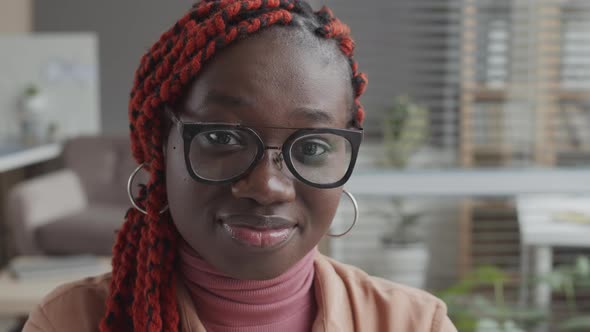 Young Attractive African-American Woman in Office